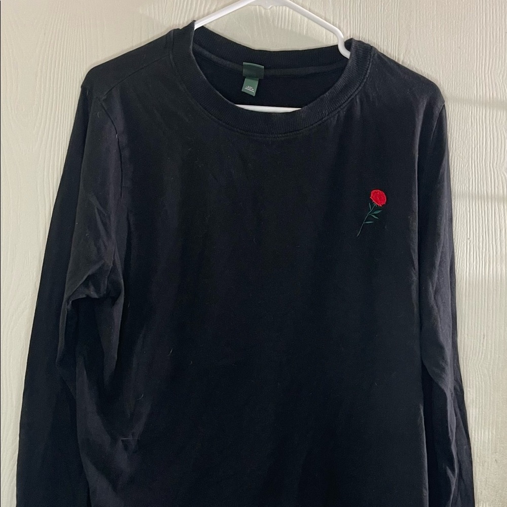 Small rose on plain long sleeve shirt